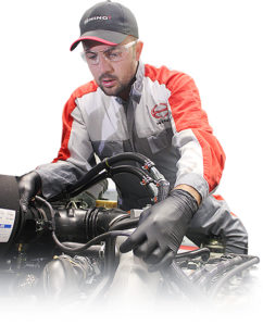 hino mechanic inspecting engine